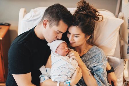 Carlin (Bates) Stewart and Evan Stewart with baby daughter Layla Rae Stewart.